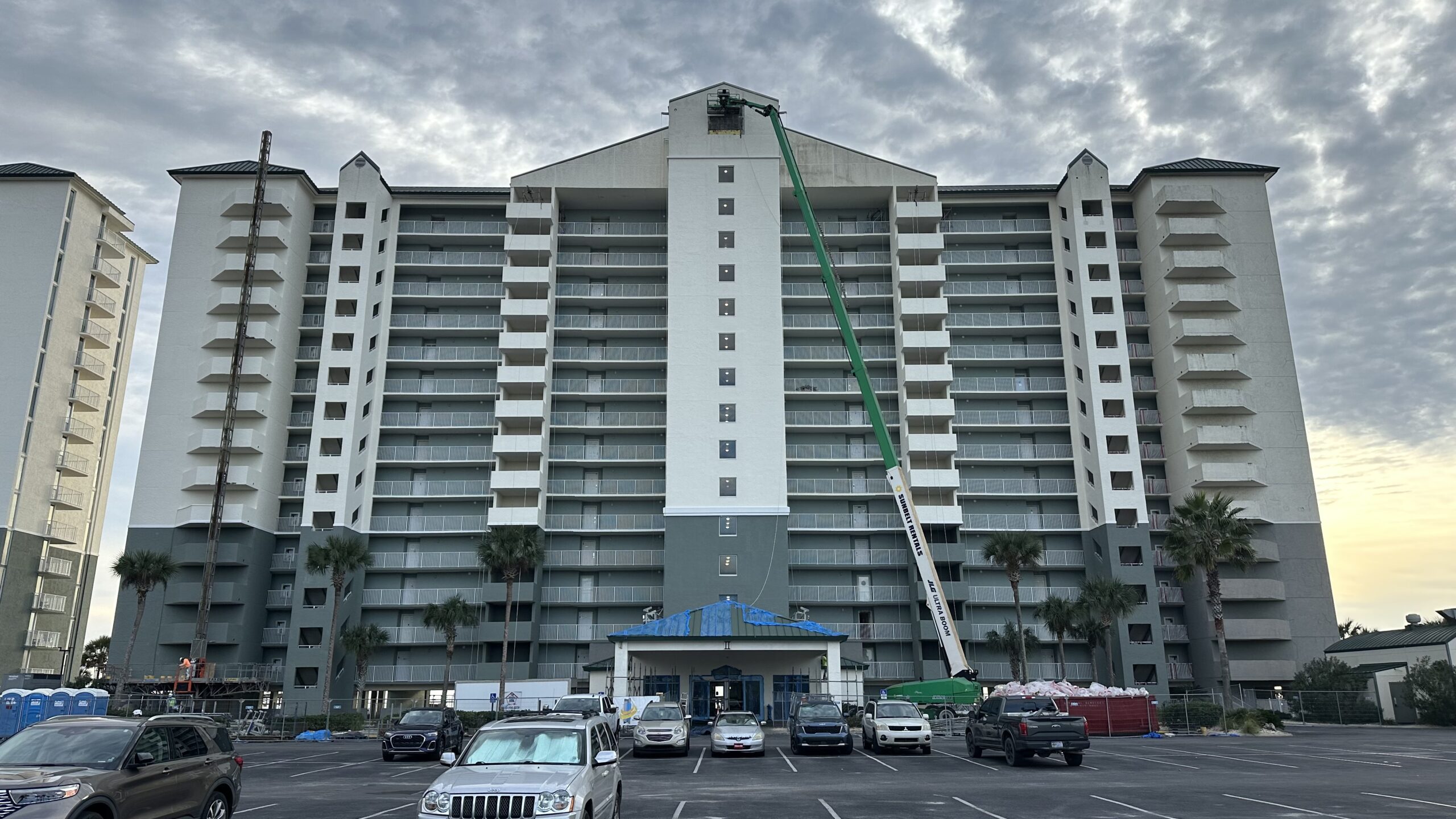 Long Beach Resort Panama City Beach tower undergoing exterior restoration in 2025