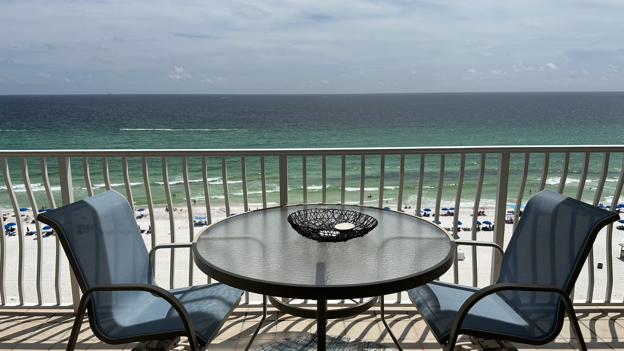 Gulf-front condo balcony overlooking Panama City Beach and the Gulf of Mexico