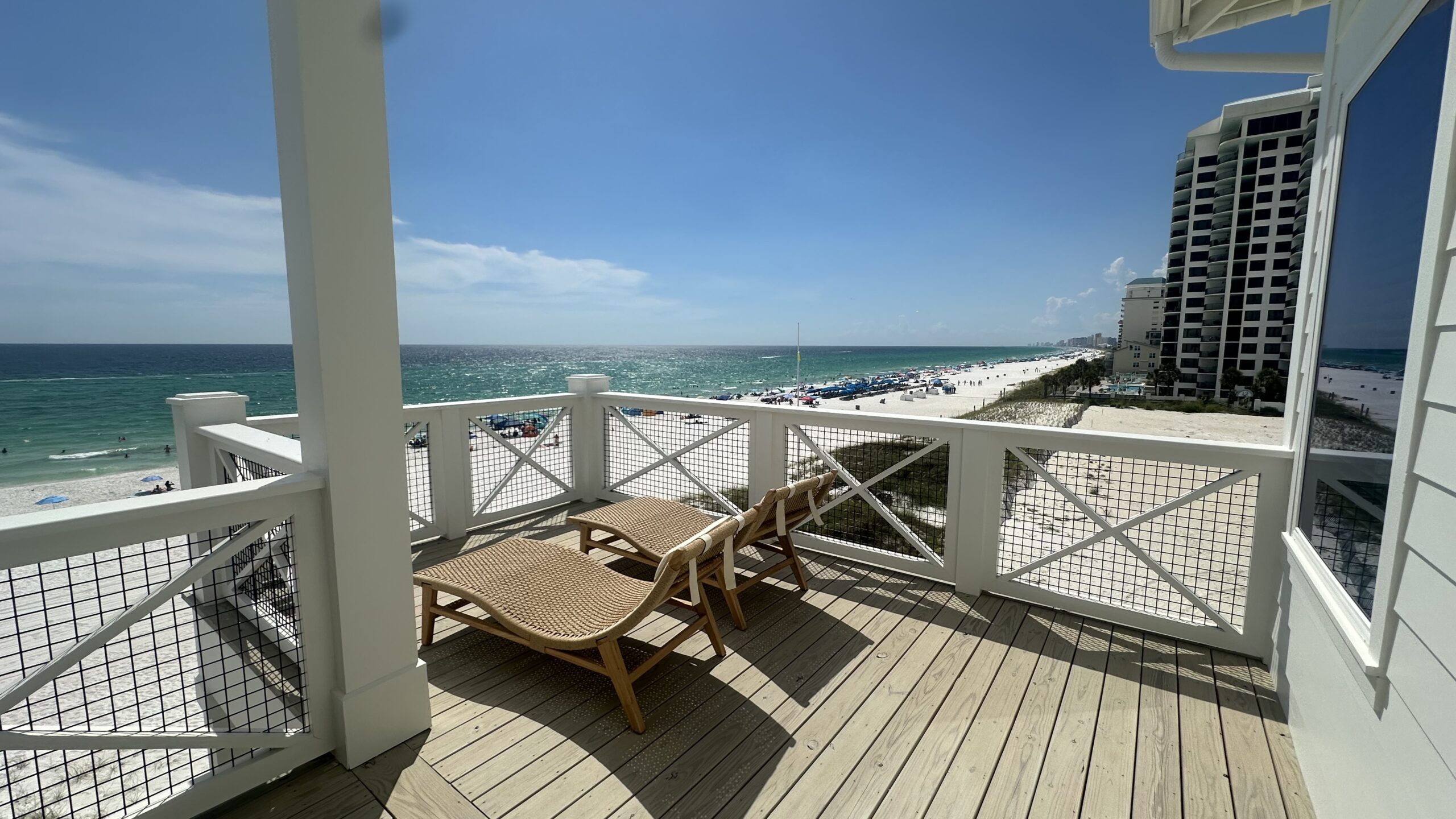 Panama City Beach vacation rental deck with lounge chairs overlooking the Gulf of Mexico